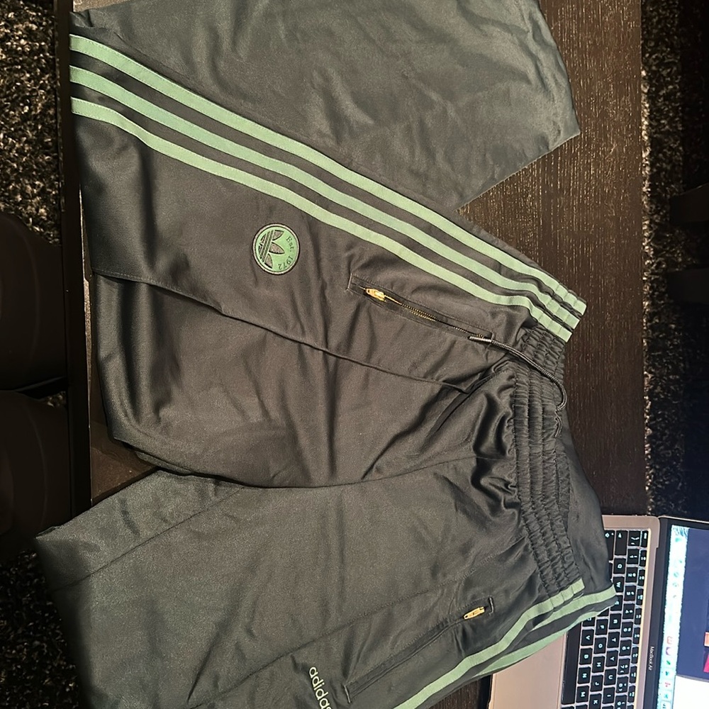 dark green adidas wide leg track pants